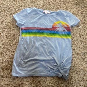 light blue top with palm tree